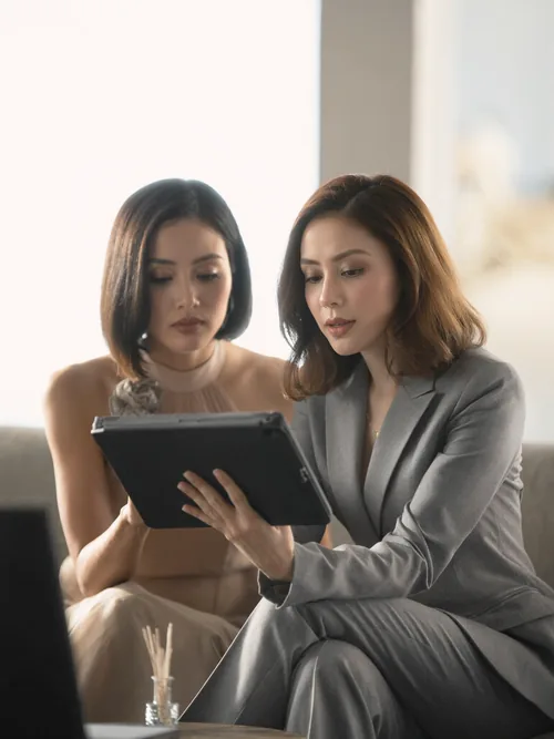 Designers reviewing material samples during a lighting consultation